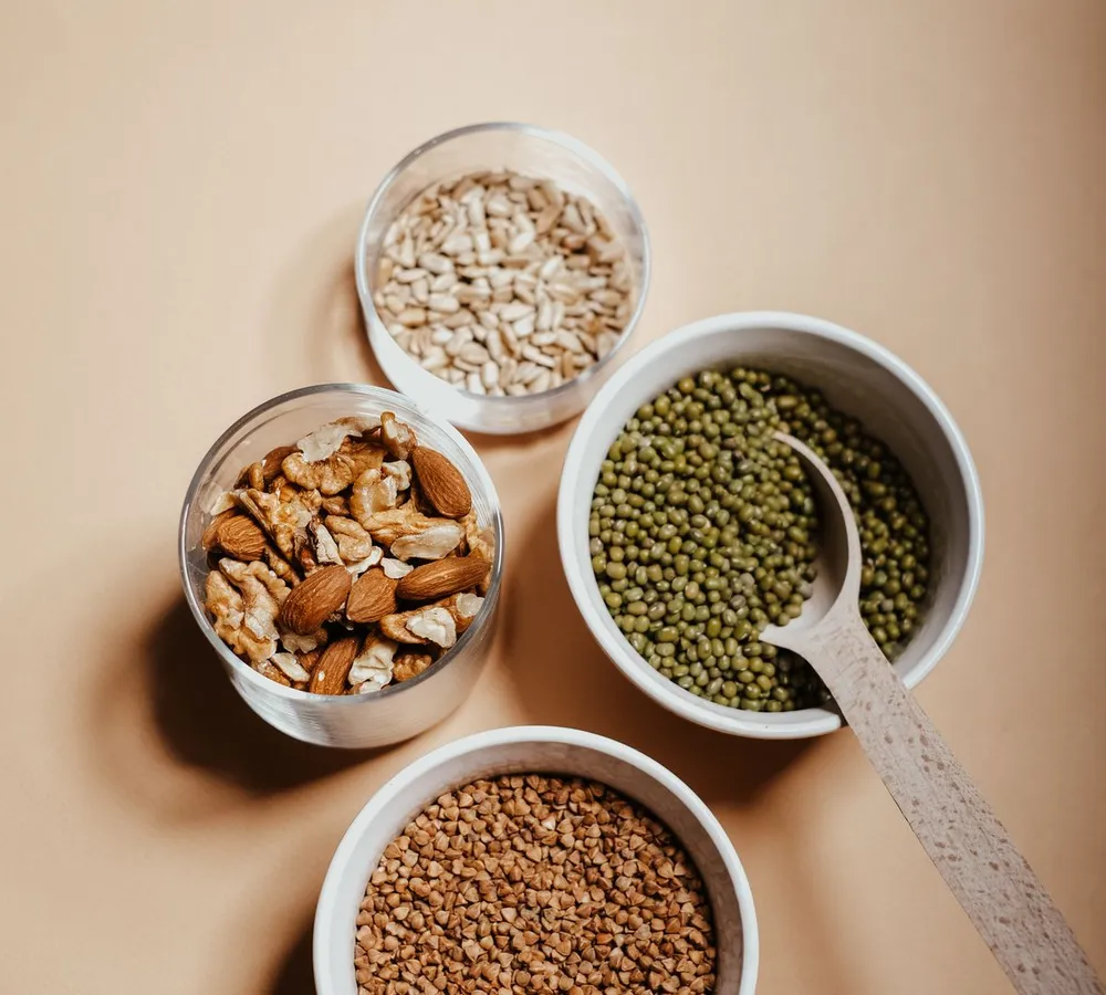 Bowls of grains, seeds, nuts and beans